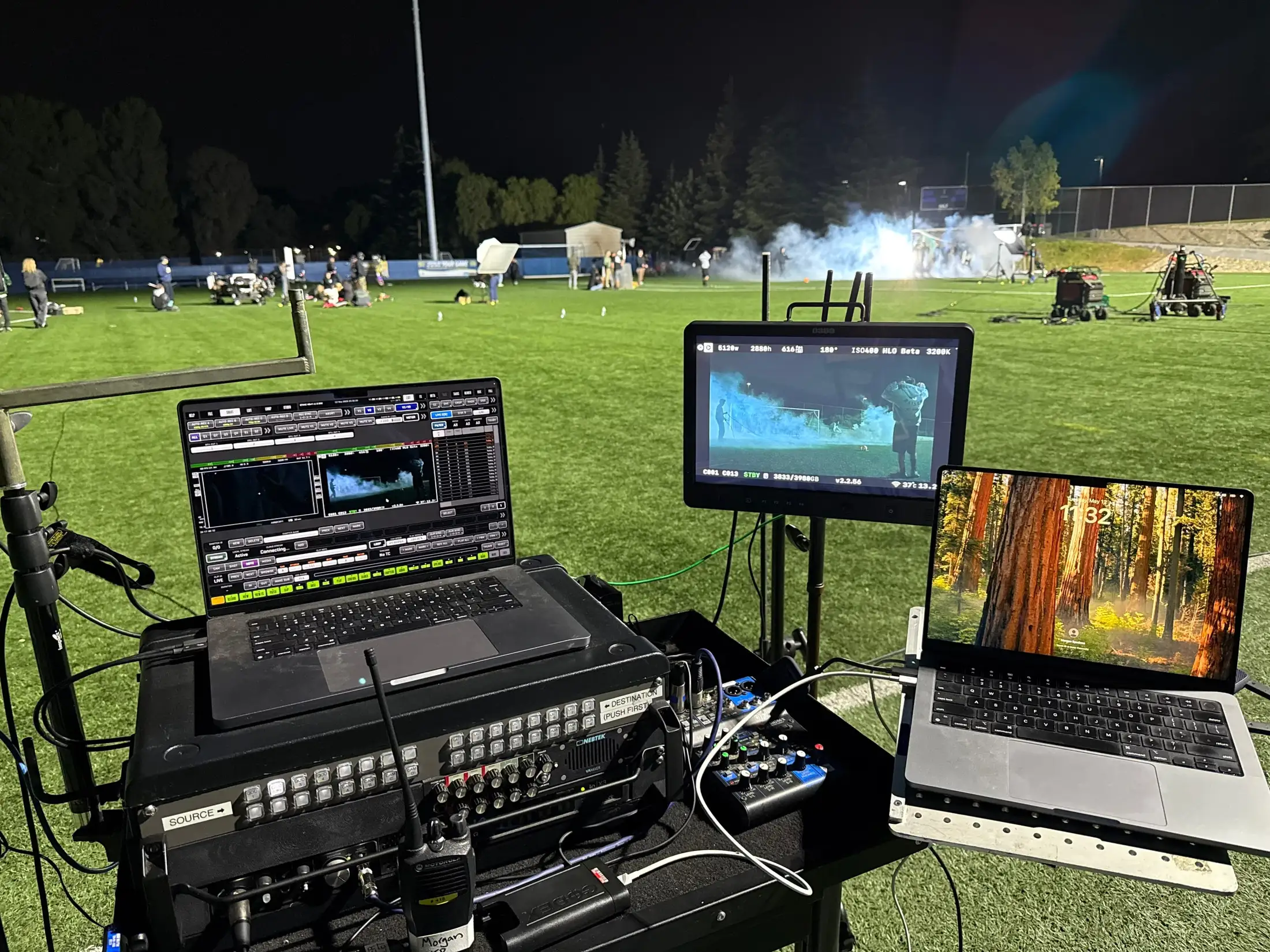 Video-assist rack showing routing, recording, and transmission hardware in use on set.